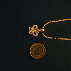Necklace with butterfly pendant